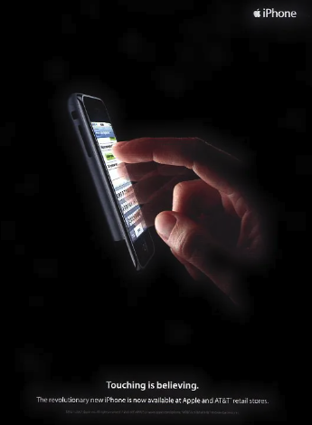 The first ever ad for Apple's iPhone with the slogan "Touching is believing"