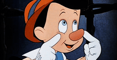 An animated GIF from the movie Pinocchio showing his nose getting longer when he lies